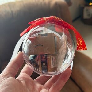 Festive Clear Ornament with Red Ribbon